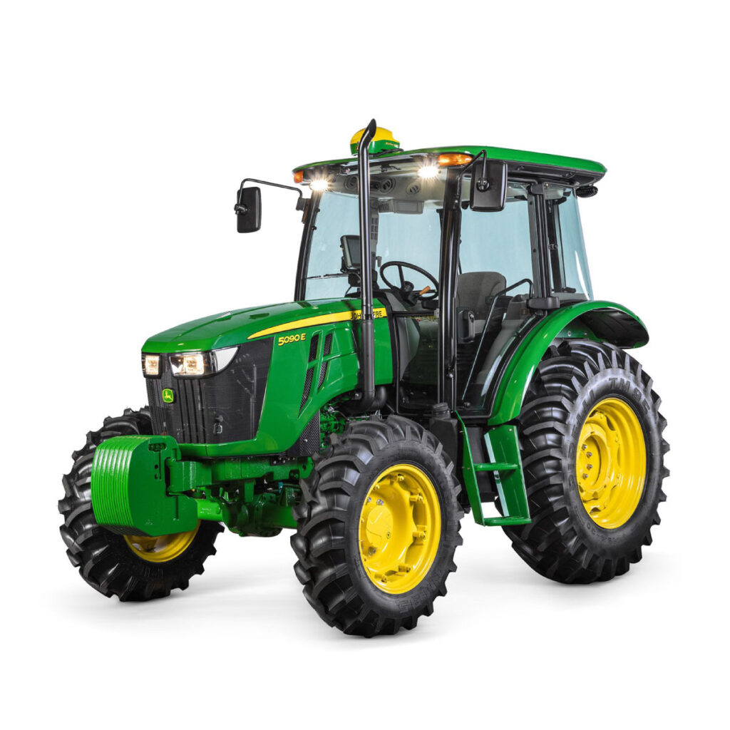 John Deere 5090E Utility Tractor with closed cab, forward work lights and amber safety lights